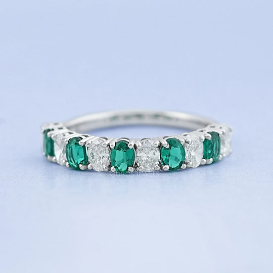 Oval Emerald And Lab Grown Diamond Half Eternity Band