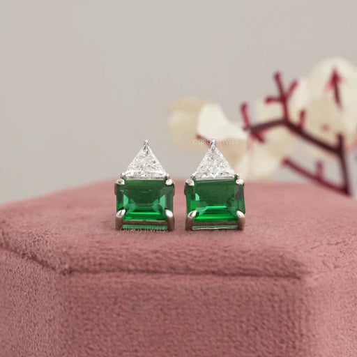 top view green emerald gemstone and trillion cut diamond screw back stud earrings