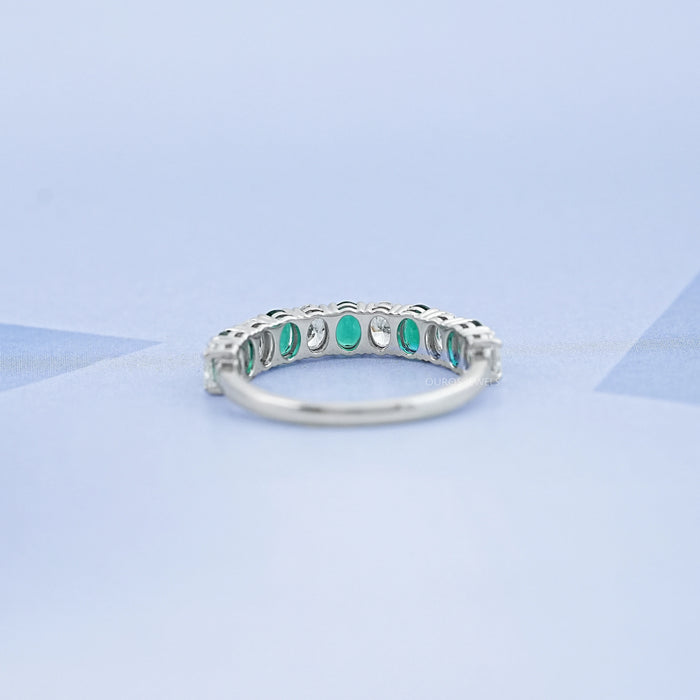 Oval Emerald And Lab Grown Diamond Half Eternity Band