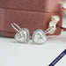 [a pair of white gold heart shaped earrings with diamonds]-[Ouros Jewels]