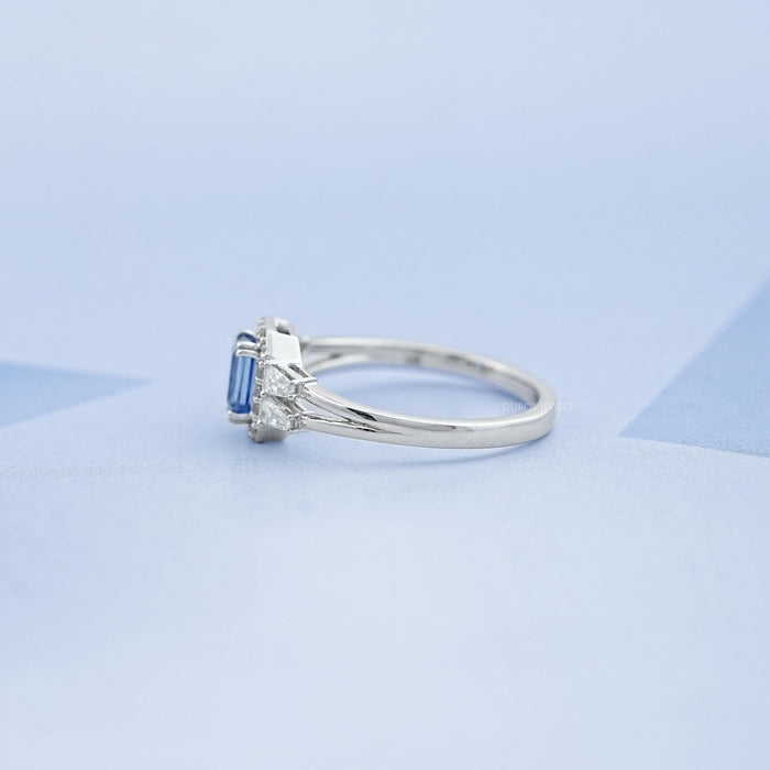 Light Blue Emerald Cut Sapphire And Lab Diamond Halo Split Shank Ring