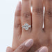 oval cut lab made diamond three stone engagement ring in finger