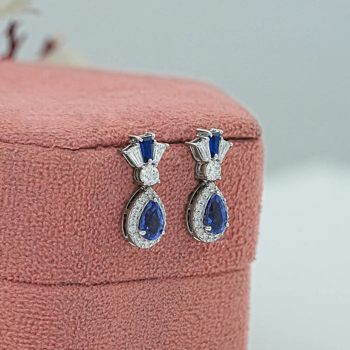 Pear Blue Gemstone And Tapered Baguette Halo Drop Earrings