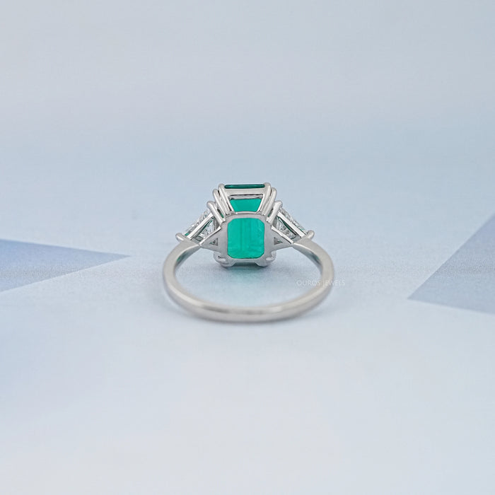 Emerald And Triangle Cut Trio Engagement Ring