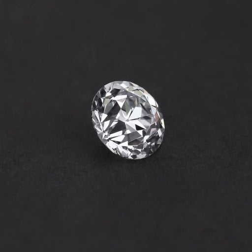 side view of 1.10 ct old european cut round customized diamond on fabric