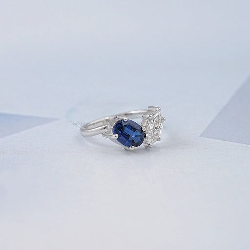 right view of sapphire oval & marquise diamond two stone toi et moi engagement ring