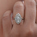 front view of marquise cut lab diamond halo set engagement ring