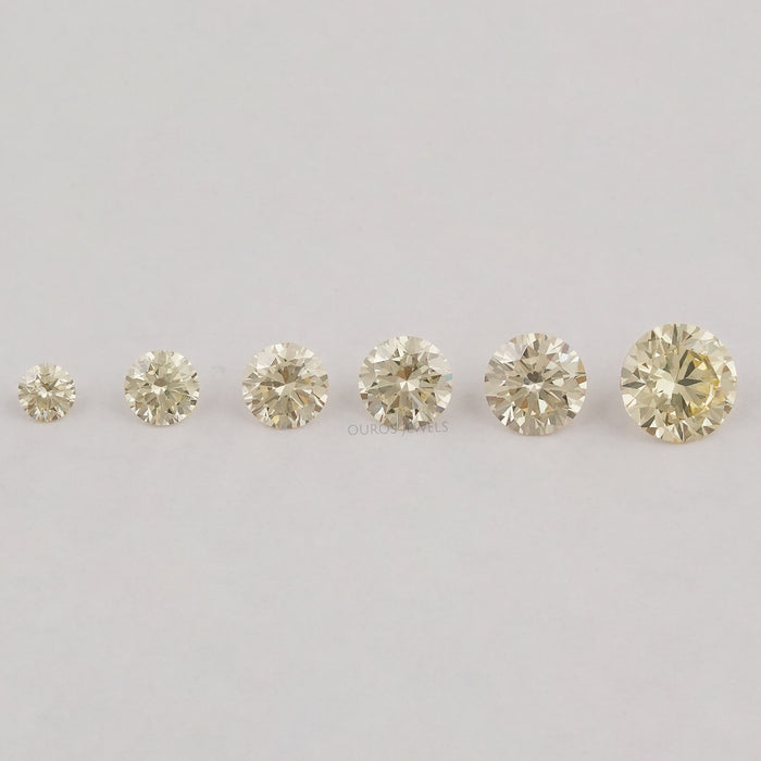 front view of brilliant round yellow loose lab grown diamonds