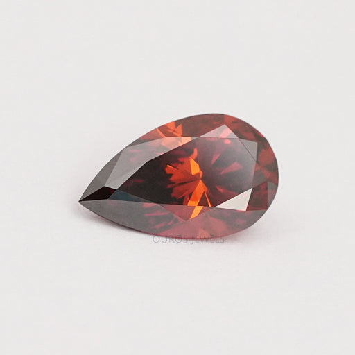 front view of red pear shaped lab grown diamond loose