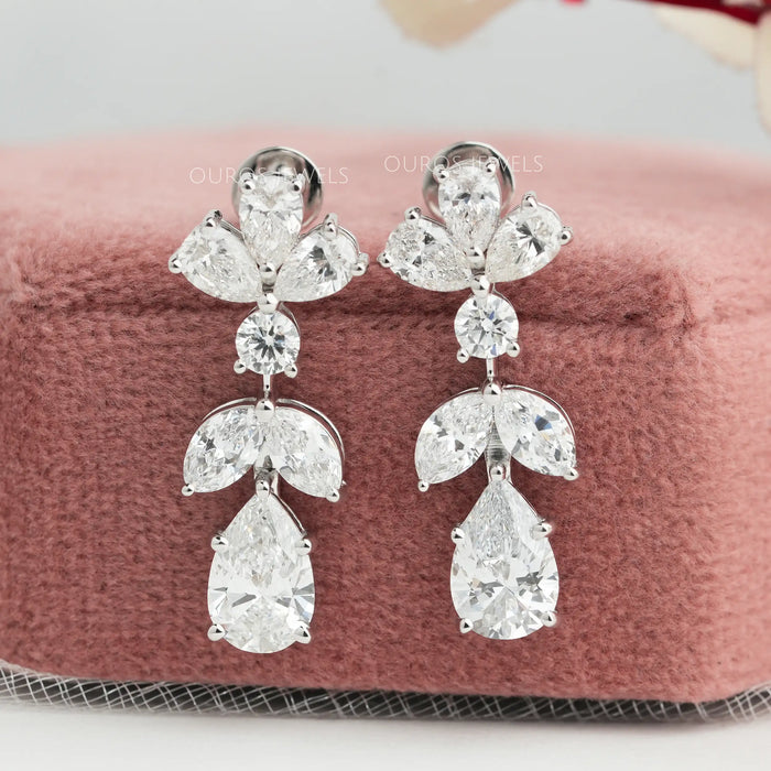 front view of pear cut and marquise lab diamond drop earrings with flat back 