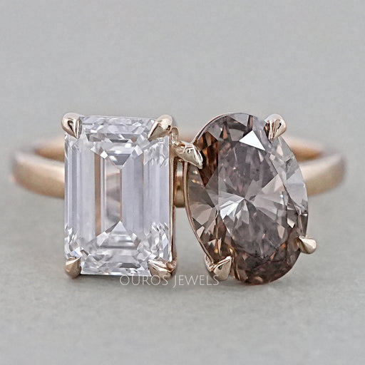 front view of emerald and champagne oval-cut diamond toi et moi engagement ring