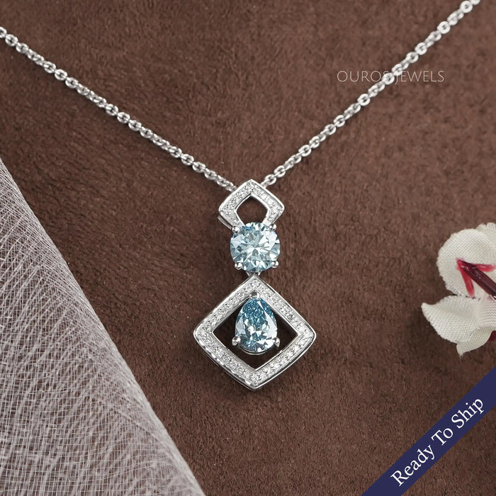 Blue Pear And Round Diamond Floating Pendant