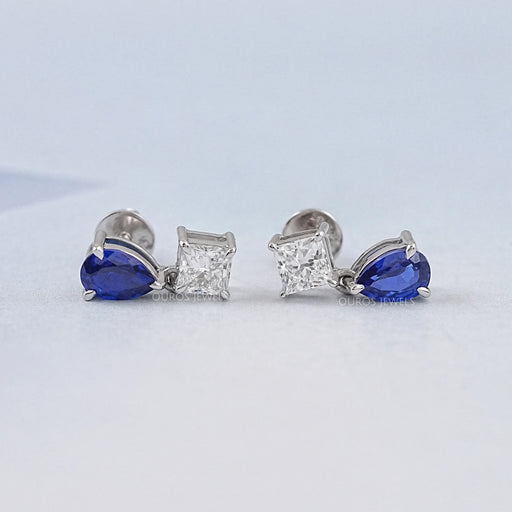 front view of pear sapphire and princess cut diamond flat back drop earrings