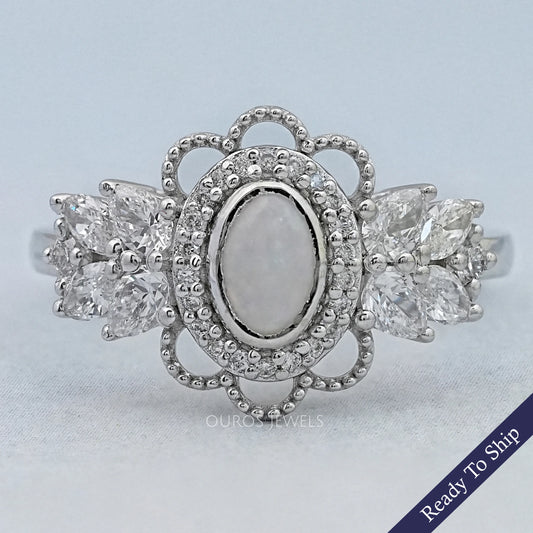Opal Oval Cut And Halo Diamond Floral Engagement Ring