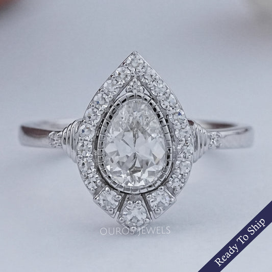 Old Mine Pear Cut And Single Round Halo Engagement Ring