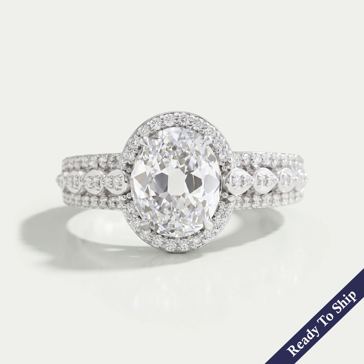 Old Mine Oval Cut Halo Diamond Engagement Ring