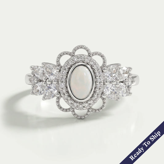 Opal Oval Cut And Halo Diamond Floral Engagement Ring