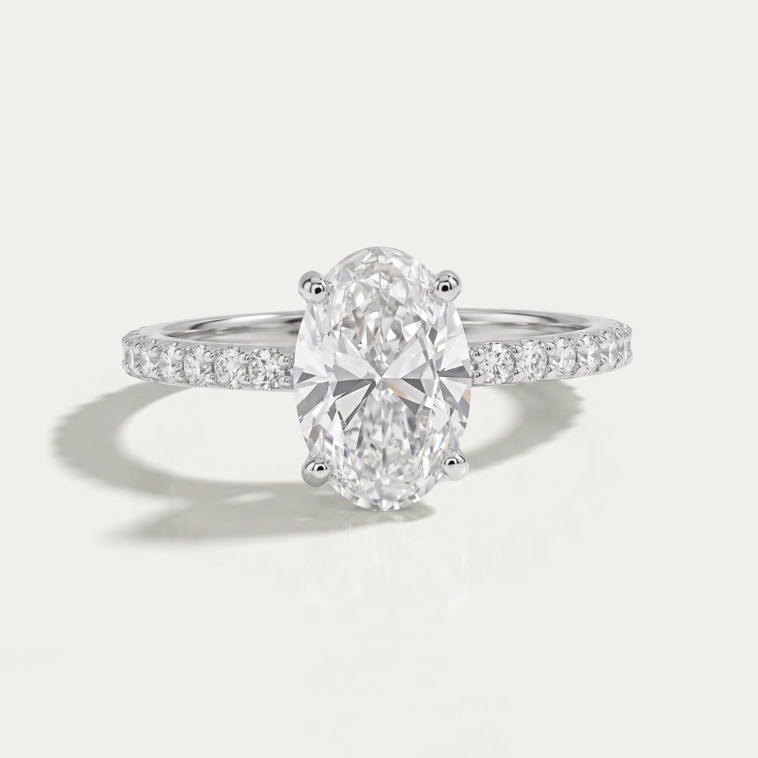 Oval Shape Solitaire With Accent Ring