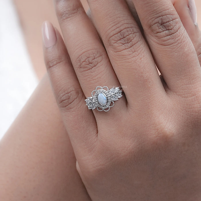 Opal Oval Cut And Halo Diamond Floral Engagement Ring