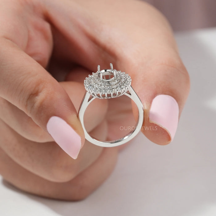 close view of oval-cut semi-mount cluster lab diamond engagement ring