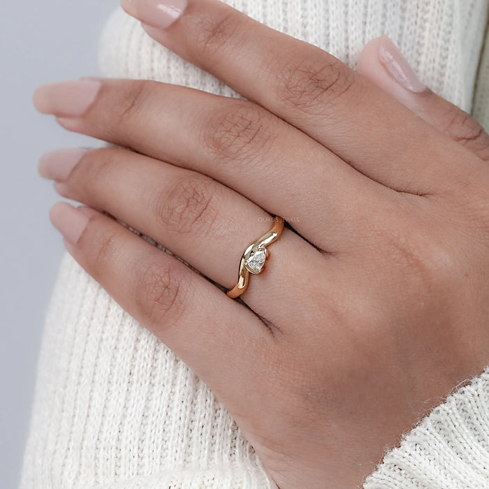 Pear Cut Diamond And Wave Gold Anniversary Ring