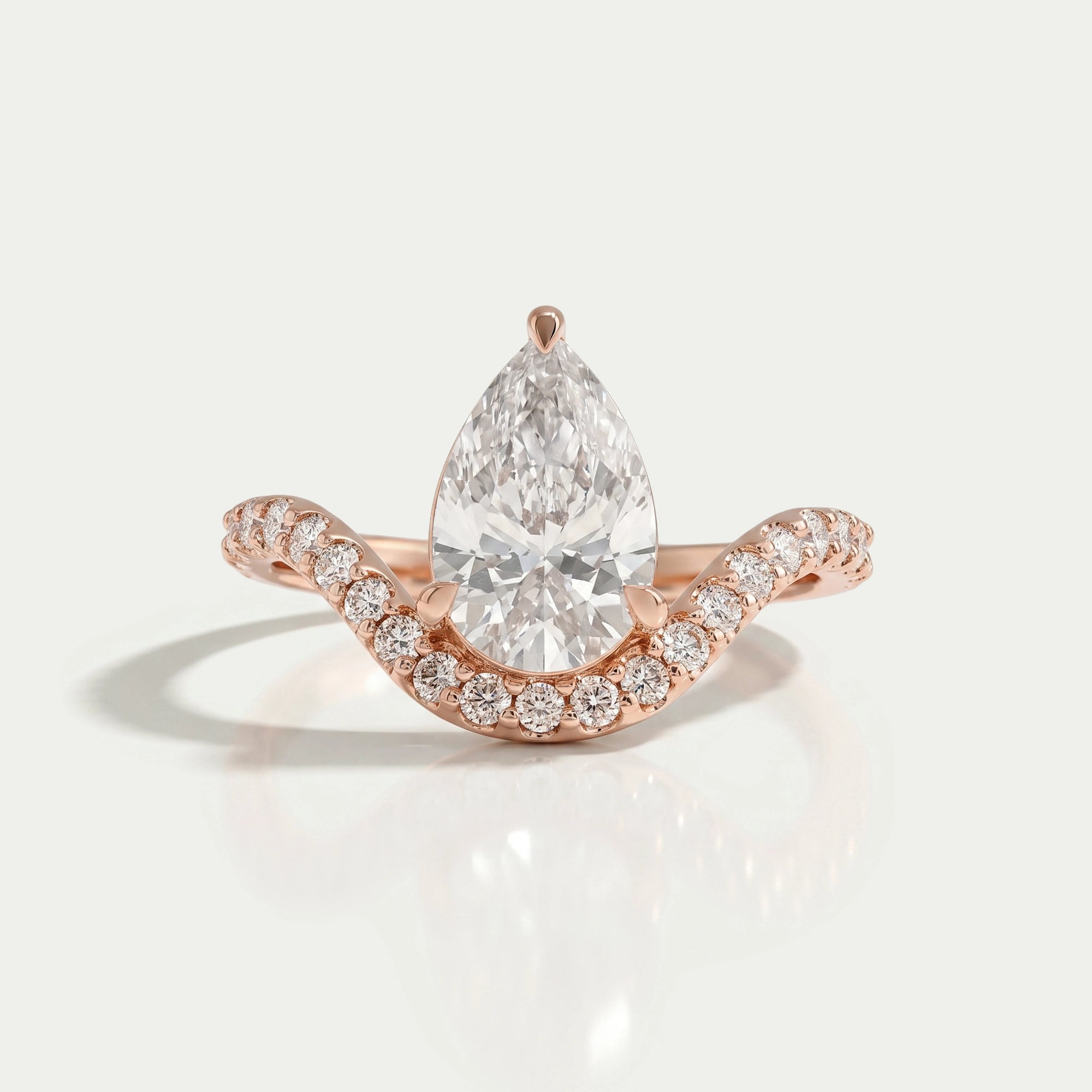 Pear Diamond Chevron Engagement Ring with Pavé Curved Band