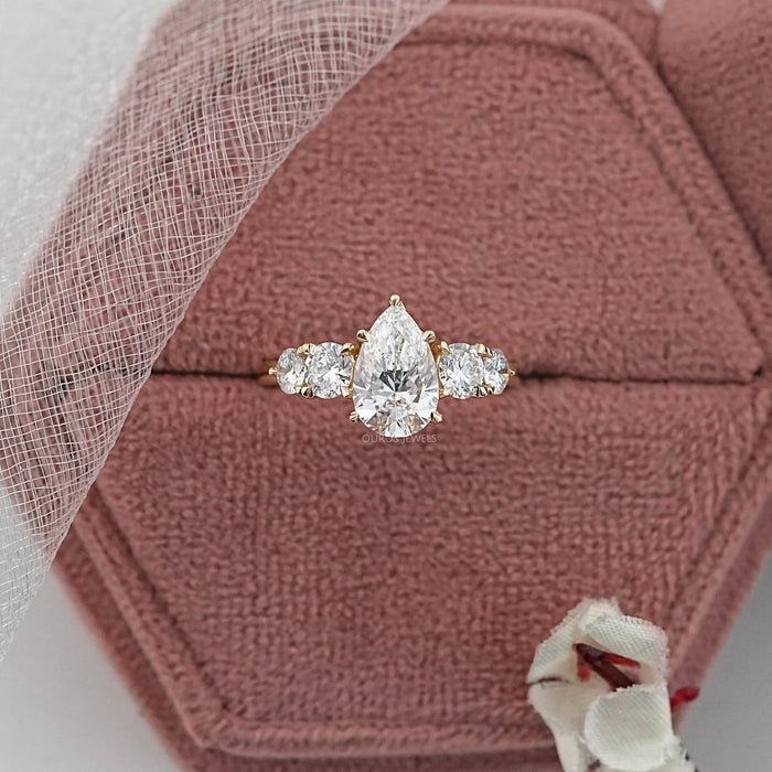 Pear And Round Diamond Five Stone Engagement Ring