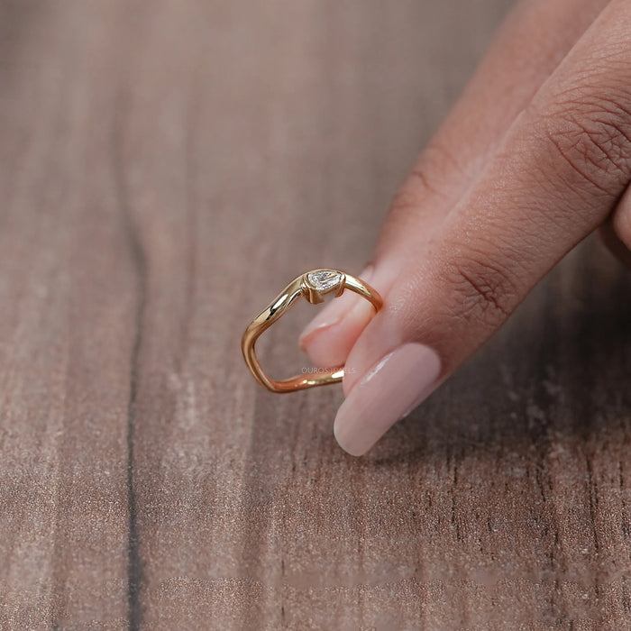 Pear Cut Diamond And Wave Gold Anniversary Ring