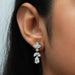 pear cut and marquise diamond prong setting drop earrings with flat back on ear