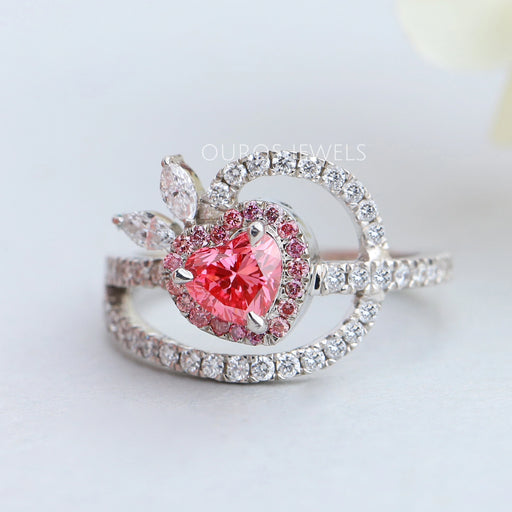 front view of pink heart-cut lab-grown diamond halo wedding ring