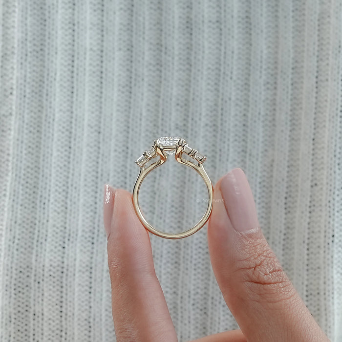 close view of princess and baguette cut lab diamond five stone engagement ring