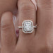 radiant cut diamond double halo engagement ring's front view in finger
