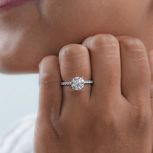 round lab-grown diamond white gold solitaire engagement ring in finger