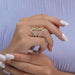 round-cut lab-grown diamond cocktail ring for party wear on model's finger