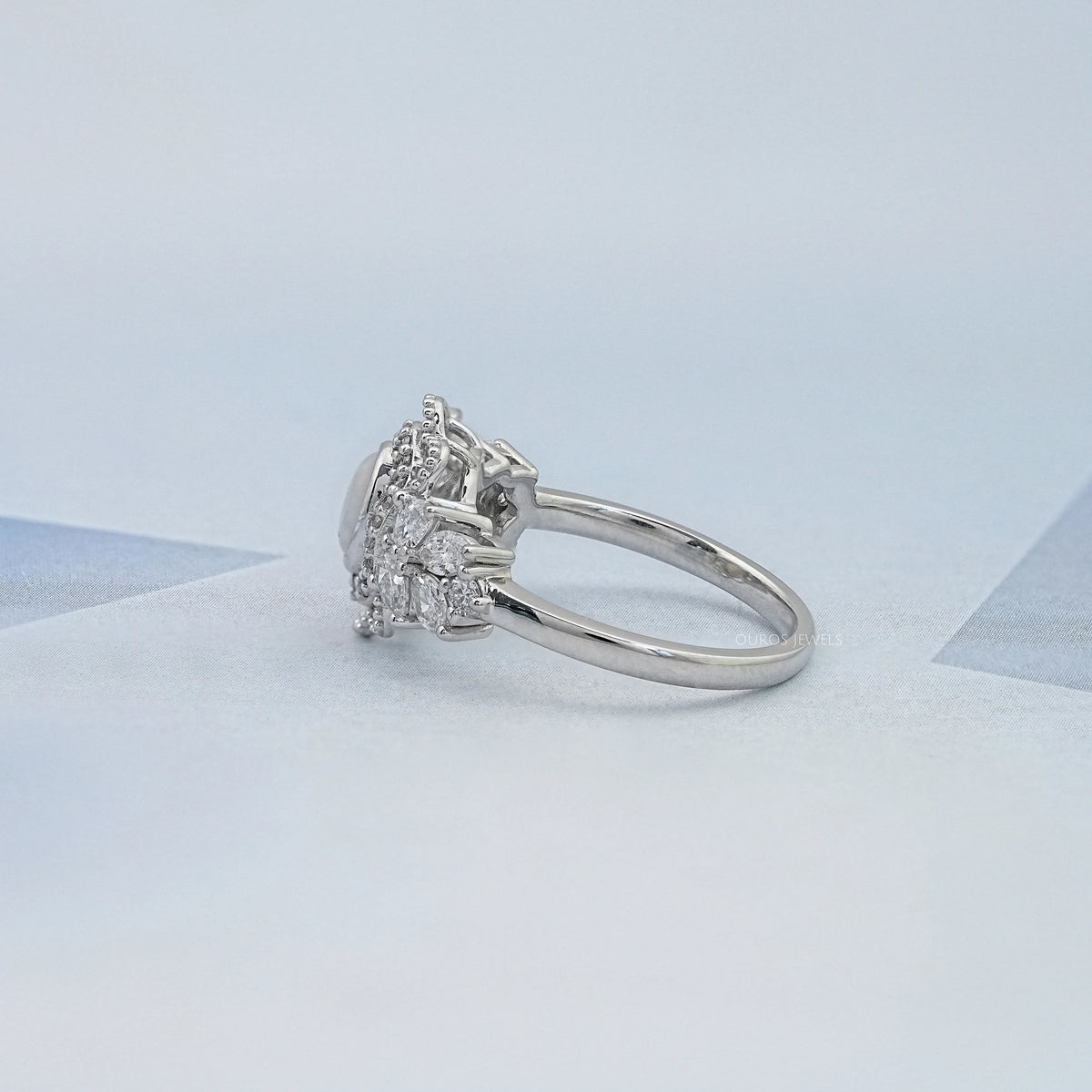 Opal Oval Cut And Halo Diamond Floral Engagement Ring