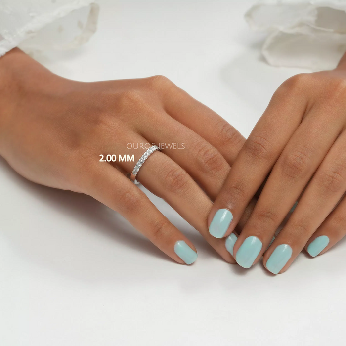 round shape lab made diamond half eternity wedding ring in finger