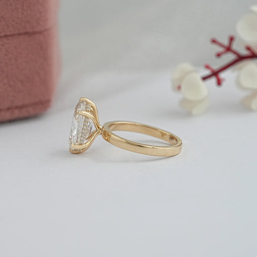 side view of portuguese oval cut lab diamond 6 prong hidden halo engagement ring