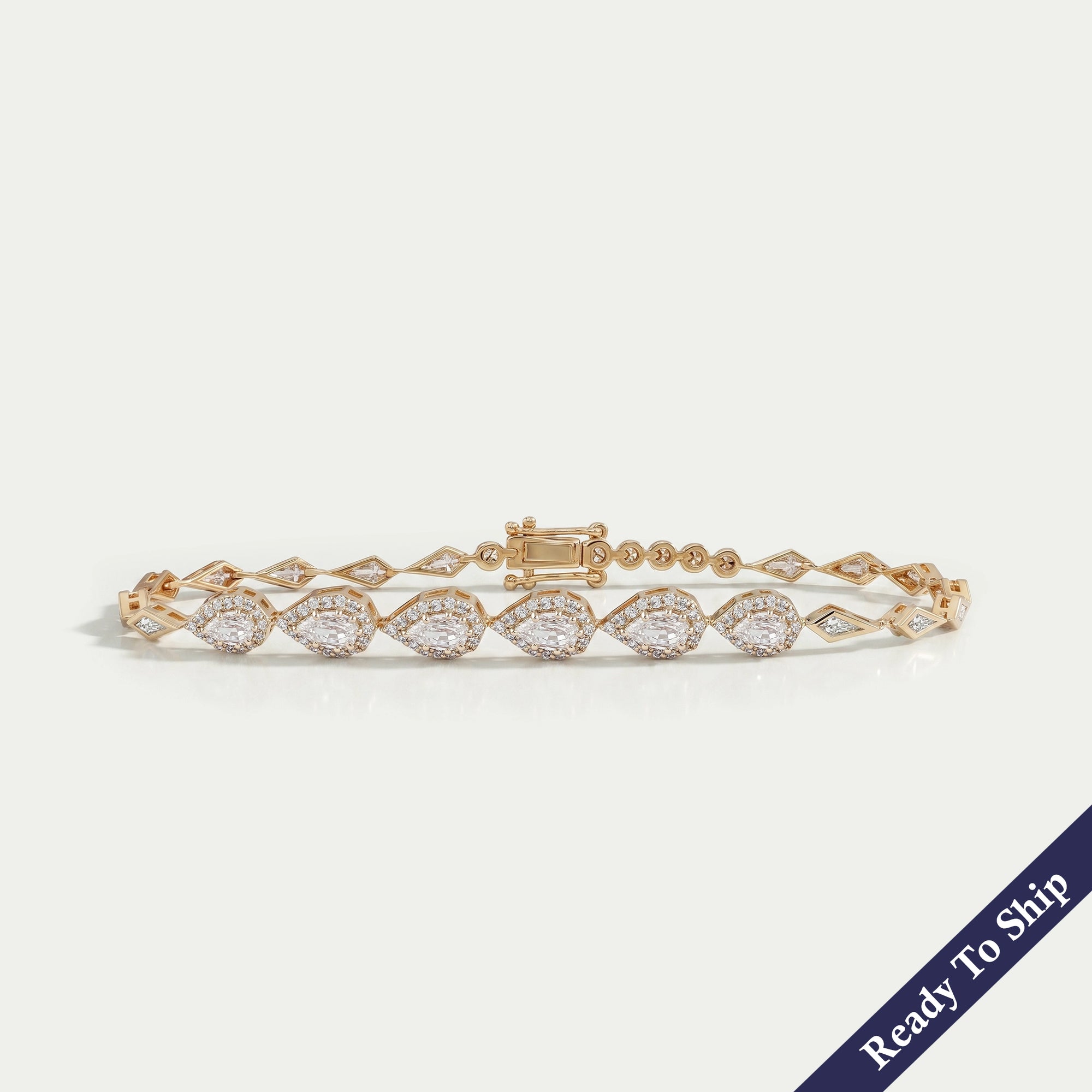 Step Cut Pear Halo Diamond Bracelet