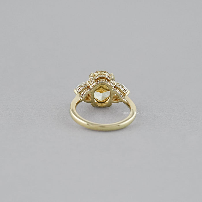 Fancy Vivid Yellow Oval Cut Hidden Halo Three Stone Ring