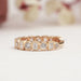 side view of baguette and round lab diamond bezel setting wedding band yellow gold