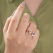 criss cut and step moval diamond bezel set toi et moi wedding ring on model's finger