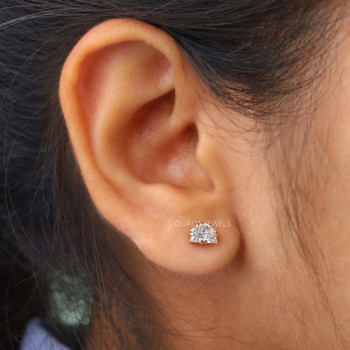 cadillac cut lab grown diamond stud earrings rose gold on ear