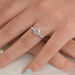 7 stone round-cut lab-grown diamond solitaire accent engagement ring in finger