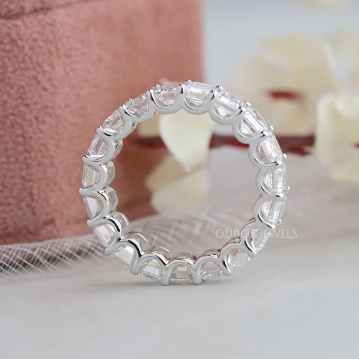 side view emerald cut lab diamond u prong setting full eternity band white gold