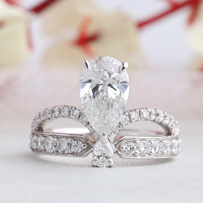front view of pear-cut lab diamond crown-style bridal engagement ring