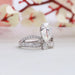 side view of pear-cut lab diamond crown-style bridal engagement ring