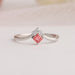 Close up view of pink princess shaped diamond ring crafted with 14k white gold & VS clarity, creates a classic look. 