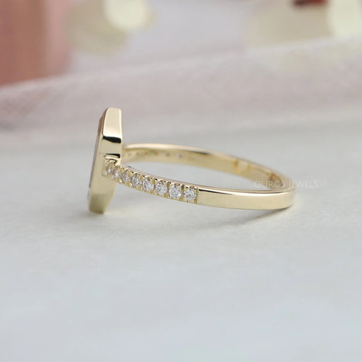 side view of hexagon long portrait cut diamond bezel set solitaire wedding ring