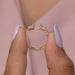 Close up look of yellow gold trapezoid cut lab diamond engagement ring