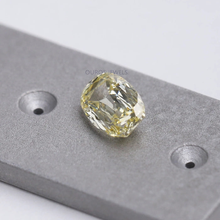 side view of yellow old mine elongated cushion cut lab grown diamond